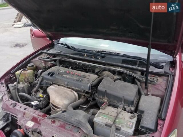 Красный Тойота Камри, объемом двигателя 2.4 л и пробегом 460 тыс. км за 5100 $, фото 4 на Automoto.ua