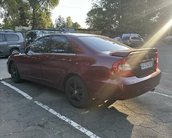 Красный Тойота Камри, объемом двигателя 3 л и пробегом 276 тыс. км за 5500 $, фото 7 на Automoto.ua