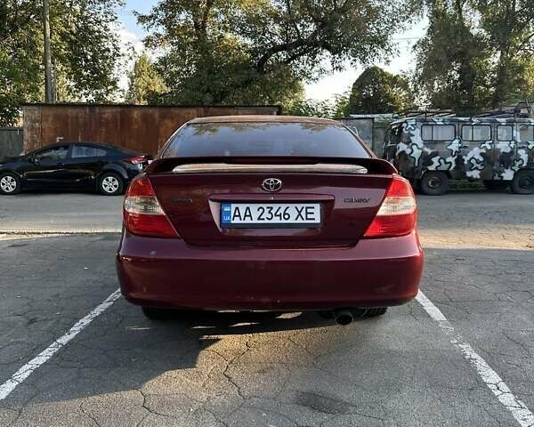 Красный Тойота Камри, объемом двигателя 3 л и пробегом 276 тыс. км за 5500 $, фото 1 на Automoto.ua