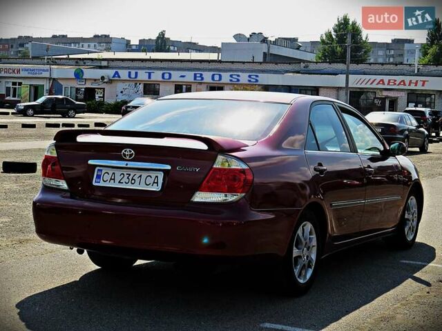 Красный Тойота Камри, объемом двигателя 2.36 л и пробегом 261 тыс. км за 5950 $, фото 2 на Automoto.ua