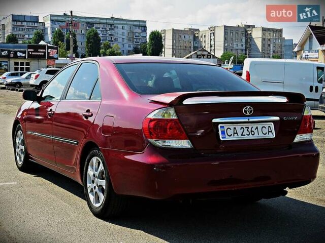 Красный Тойота Камри, объемом двигателя 2.36 л и пробегом 261 тыс. км за 5950 $, фото 3 на Automoto.ua