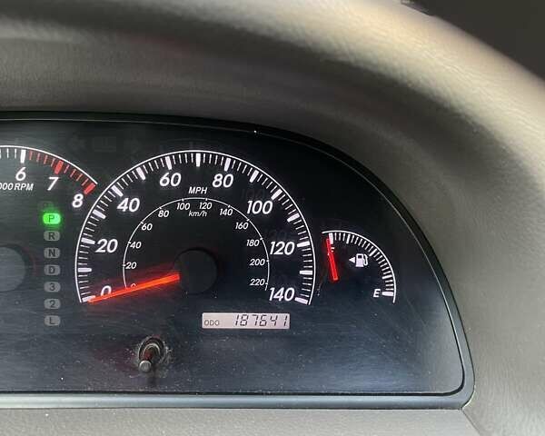 Красный Тойота Камри, объемом двигателя 2.4 л и пробегом 301 тыс. км за 5300 $, фото 18 на Automoto.ua