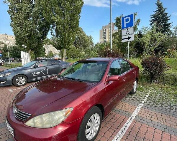 Красный Тойота Камри, объемом двигателя 2.4 л и пробегом 301 тыс. км за 5300 $, фото 4 на Automoto.ua