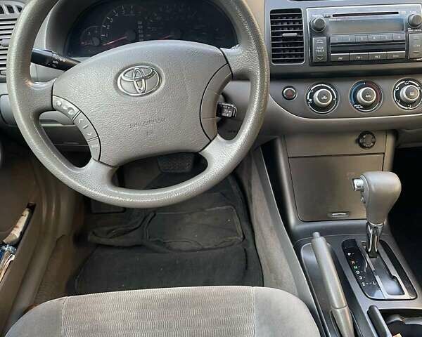 Красный Тойота Камри, объемом двигателя 2.4 л и пробегом 301 тыс. км за 5300 $, фото 12 на Automoto.ua