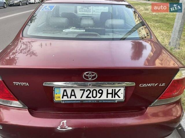 Красный Тойота Камри, объемом двигателя 2.4 л и пробегом 301 тыс. км за 5300 $, фото 20 на Automoto.ua