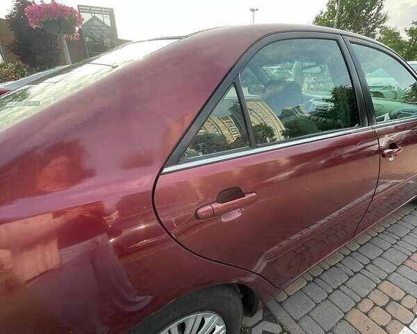 Красный Тойота Камри, объемом двигателя 2.4 л и пробегом 301 тыс. км за 5300 $, фото 2 на Automoto.ua