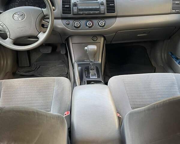 Красный Тойота Камри, объемом двигателя 2.4 л и пробегом 301 тыс. км за 5300 $, фото 13 на Automoto.ua