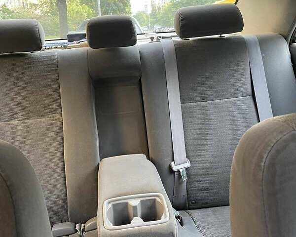 Красный Тойота Камри, объемом двигателя 2.4 л и пробегом 301 тыс. км за 5300 $, фото 16 на Automoto.ua