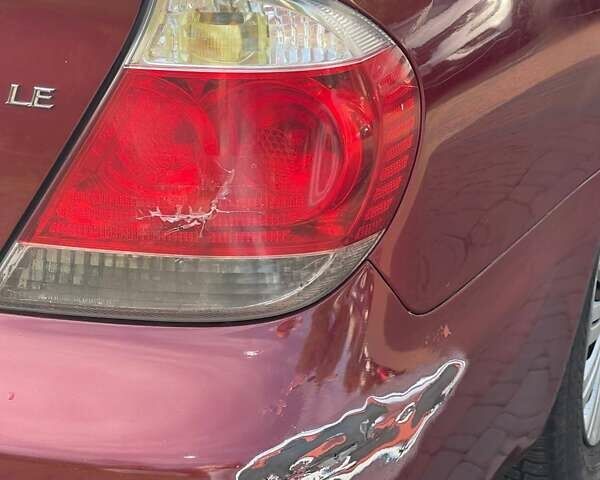 Красный Тойота Камри, объемом двигателя 2.4 л и пробегом 301 тыс. км за 5300 $, фото 9 на Automoto.ua