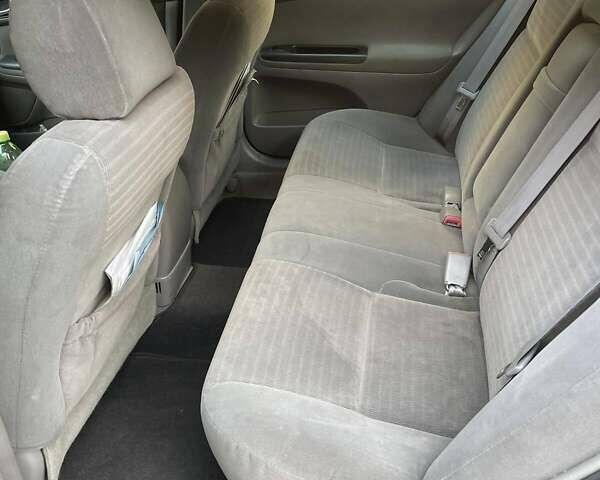 Красный Тойота Камри, объемом двигателя 2.4 л и пробегом 301 тыс. км за 5300 $, фото 17 на Automoto.ua