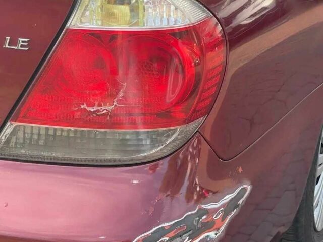 Красный Тойота Камри, объемом двигателя 2.4 л и пробегом 301 тыс. км за 4499 $, фото 7 на Automoto.ua