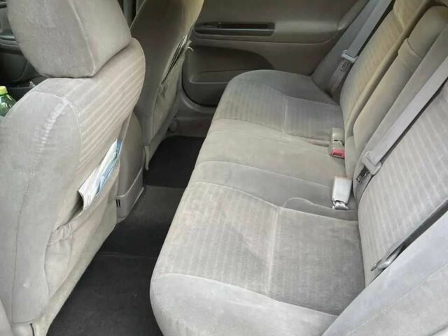 Красный Тойота Камри, объемом двигателя 2.4 л и пробегом 301 тыс. км за 4499 $, фото 12 на Automoto.ua