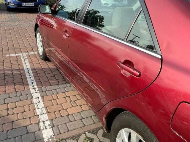 Красный Тойота Камри, объемом двигателя 2.4 л и пробегом 301 тыс. км за 4499 $, фото 5 на Automoto.ua