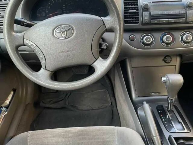 Красный Тойота Камри, объемом двигателя 2.4 л и пробегом 301 тыс. км за 4499 $, фото 13 на Automoto.ua