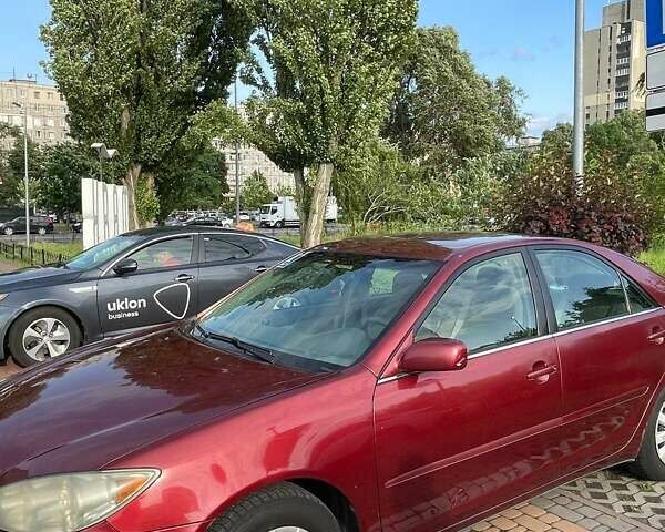 Красный Тойота Камри, объемом двигателя 2.4 л и пробегом 301 тыс. км за 5300 $, фото 5 на Automoto.ua