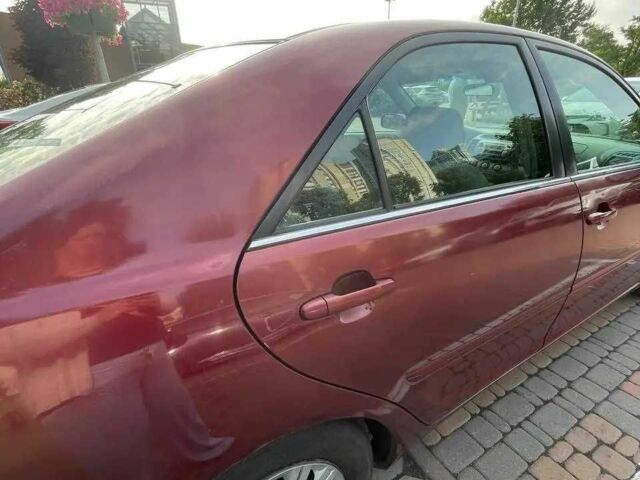 Красный Тойота Камри, объемом двигателя 2.4 л и пробегом 301 тыс. км за 4499 $, фото 3 на Automoto.ua