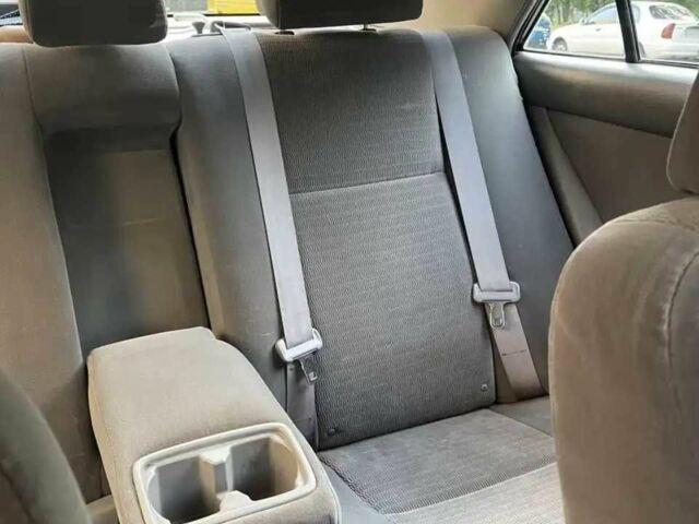 Красный Тойота Камри, объемом двигателя 2.4 л и пробегом 301 тыс. км за 4499 $, фото 16 на Automoto.ua