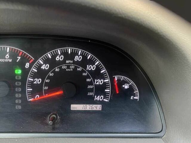 Красный Тойота Камри, объемом двигателя 2.4 л и пробегом 301 тыс. км за 4499 $, фото 18 на Automoto.ua