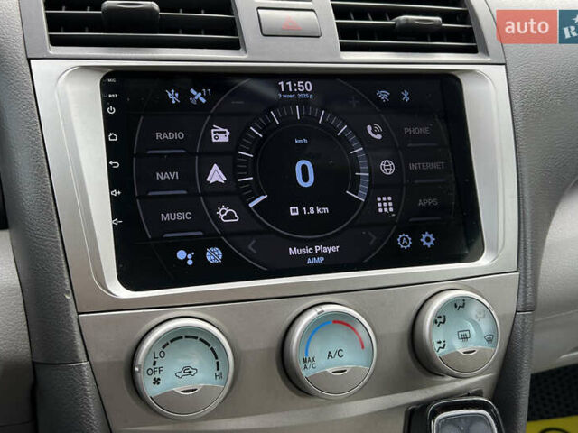 Красный Тойота Камри, объемом двигателя 2.36 л и пробегом 211 тыс. км за 8850 $, фото 12 на Automoto.ua