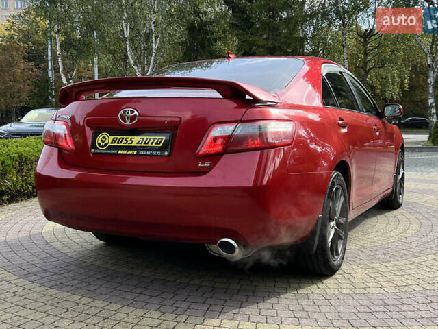 Красный Тойота Камри, объемом двигателя 2.36 л и пробегом 211 тыс. км за 8850 $, фото 6 на Automoto.ua