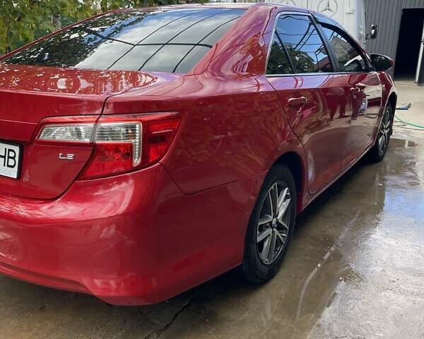 Красный Тойота Камри, объемом двигателя 2.5 л и пробегом 198 тыс. км за 10000 $, фото 4 на Automoto.ua