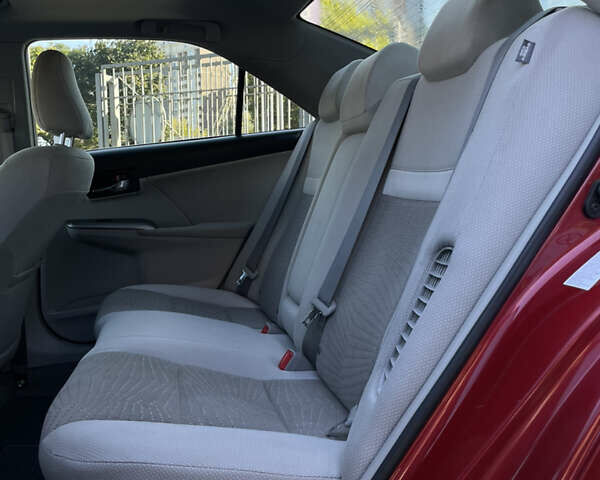 Красный Тойота Камри, объемом двигателя 2.5 л и пробегом 198 тыс. км за 11500 $, фото 25 на Automoto.ua