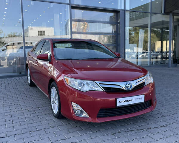 Красный Тойота Камри, объемом двигателя 2.5 л и пробегом 198 тыс. км за 11500 $, фото 1 на Automoto.ua