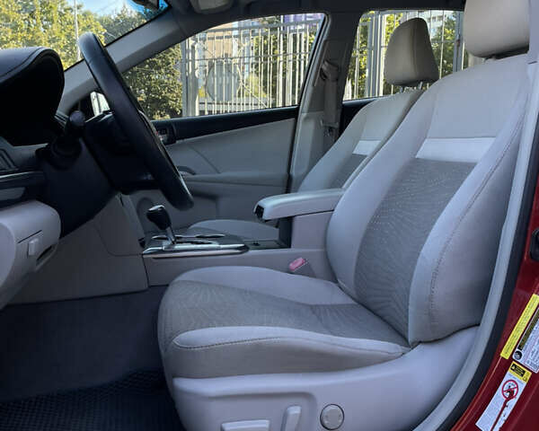 Красный Тойота Камри, объемом двигателя 2.5 л и пробегом 198 тыс. км за 11500 $, фото 13 на Automoto.ua