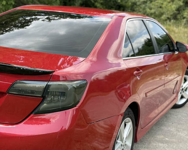 Красный Тойота Камри, объемом двигателя 2.49 л и пробегом 161 тыс. км за 13500 $, фото 7 на Automoto.ua