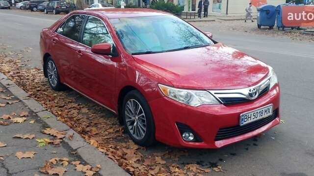 Красный Тойота Камри, объемом двигателя 2.49 л и пробегом 188 тыс. км за 11500 $, фото 1 на Automoto.ua