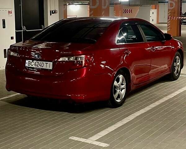 Червоний Тойота Камрі, об'ємом двигуна 2.49 л та пробігом 283 тис. км за 8600 $, фото 4 на Automoto.ua