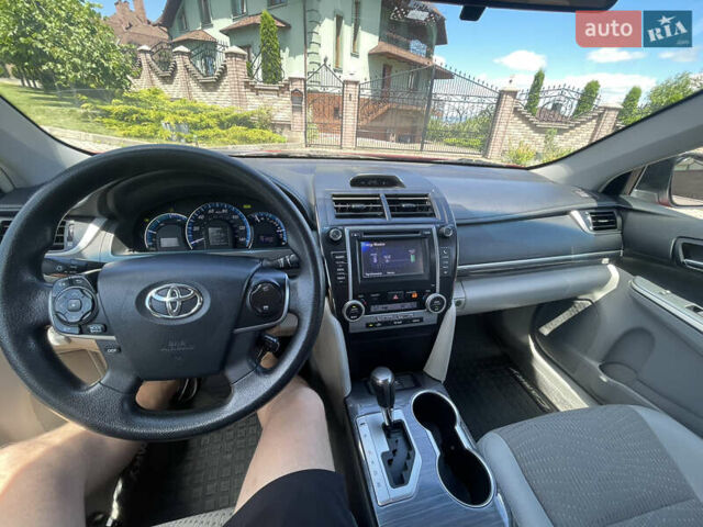 Червоний Тойота Камрі, об'ємом двигуна 2.49 л та пробігом 243 тис. км за 13200 $, фото 12 на Automoto.ua