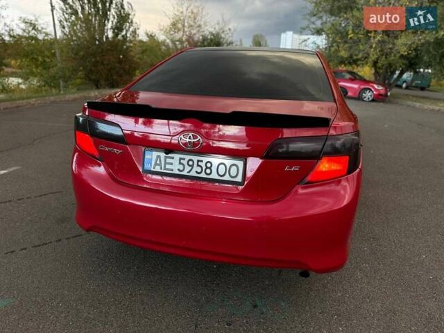 Тойота Камри 2013 в Кривом Роге на Automoto.ua Красный Тойота Камри, объемом двигателя 2.5 л и пробегом 177 тыс. км за 10700 $, фото 22 на Automoto.ua