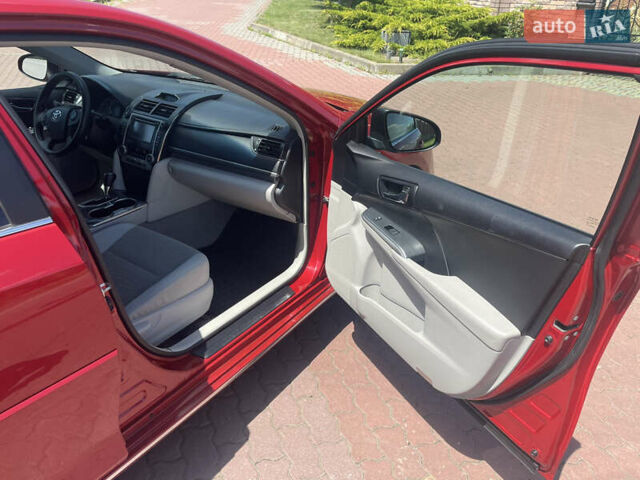 Червоний Тойота Камрі, об'ємом двигуна 2.49 л та пробігом 243 тис. км за 13200 $, фото 8 на Automoto.ua