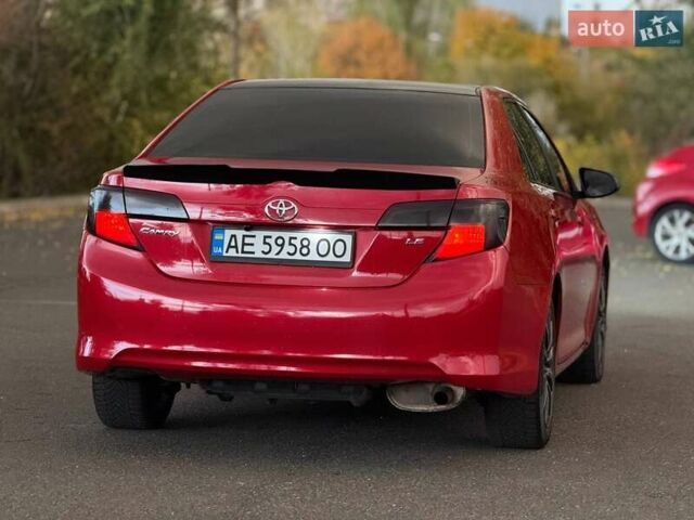 Тойота Камри 2013 в Кривом Роге на Automoto.ua Красный Тойота Камри, объемом двигателя 2.5 л и пробегом 177 тыс. км за 10700 $, фото 14 на Automoto.ua