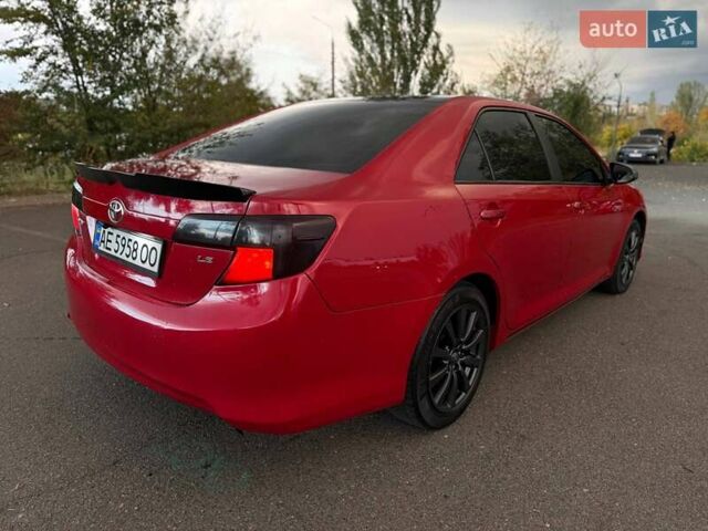 Тойота Камри 2013 в Кривом Роге на Automoto.ua Красный Тойота Камри, объемом двигателя 2.5 л и пробегом 177 тыс. км за 10700 $, фото 20 на Automoto.ua
