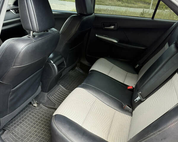 Красный Тойота Камри, объемом двигателя 2.49 л и пробегом 161 тыс. км за 13500 $, фото 10 на Automoto.ua