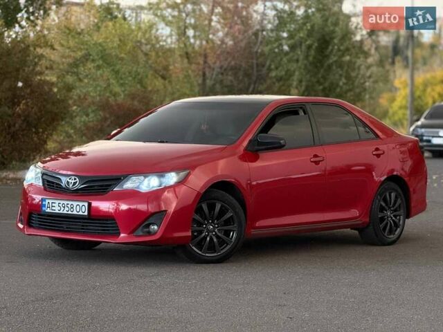 Тойота Камри 2013 в Кривом Роге на Automoto.ua Красный Тойота Камри, объемом двигателя 2.5 л и пробегом 177 тыс. км за 10700 $, фото 1 на Automoto.ua