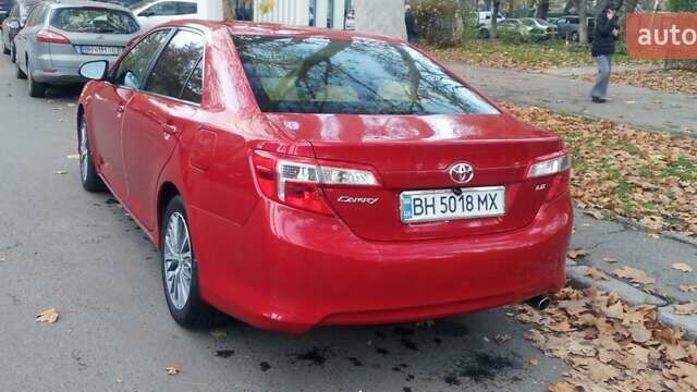 Красный Тойота Камри, объемом двигателя 2.49 л и пробегом 188 тыс. км за 11500 $, фото 3 на Automoto.ua