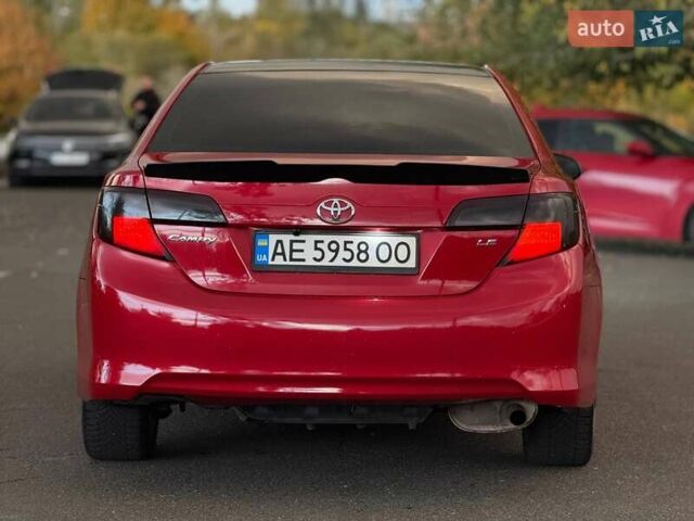 Тойота Камри 2013 в Кривом Роге на Automoto.ua Красный Тойота Камри, объемом двигателя 2.5 л и пробегом 177 тыс. км за 10700 $, фото 15 на Automoto.ua