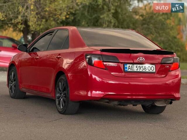 Тойота Камри 2013 в Кривом Роге на Automoto.ua Красный Тойота Камри, объемом двигателя 2.5 л и пробегом 177 тыс. км за 10700 $, фото 16 на Automoto.ua