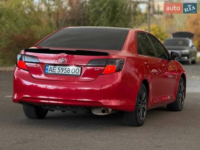 Тойота Камри 2013 в Кривом Роге на Automoto.ua Красный Тойота Камри, объемом двигателя 2.5 л и пробегом 177 тыс. км за 10700 $, фото 13 на Automoto.ua