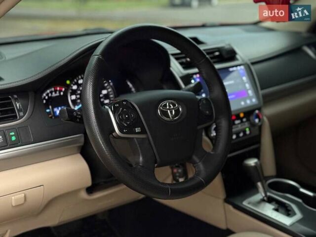 Тойота Камри 2013 в Кривом Роге на Automoto.ua Красный Тойота Камри, объемом двигателя 2.5 л и пробегом 177 тыс. км за 10700 $, фото 33 на Automoto.ua