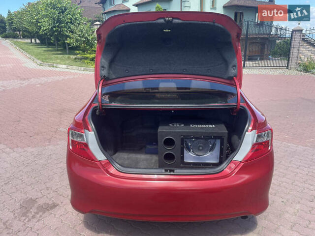 Червоний Тойота Камрі, об'ємом двигуна 2.49 л та пробігом 243 тис. км за 13200 $, фото 4 на Automoto.ua