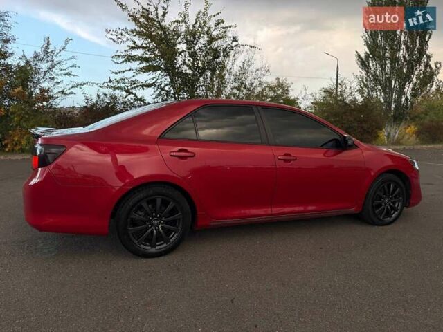 Тойота Камри 2013 в Кривом Роге на Automoto.ua Красный Тойота Камри, объемом двигателя 2.5 л и пробегом 177 тыс. км за 10700 $, фото 19 на Automoto.ua