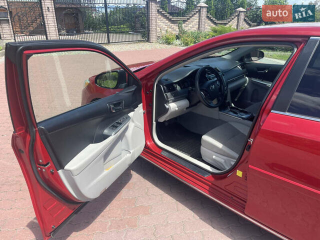 Червоний Тойота Камрі, об'ємом двигуна 2.49 л та пробігом 243 тис. км за 13200 $, фото 5 на Automoto.ua