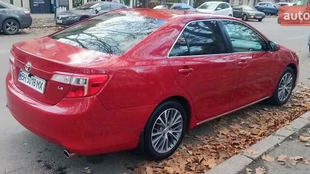 Красный Тойота Камри, объемом двигателя 2.49 л и пробегом 188 тыс. км за 11500 $, фото 2 на Automoto.ua