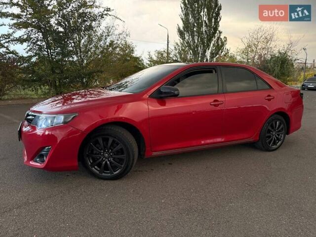 Тойота Камри 2013 в Кривом Роге на Automoto.ua Красный Тойота Камри, объемом двигателя 2.5 л и пробегом 177 тыс. км за 10700 $, фото 7 на Automoto.ua