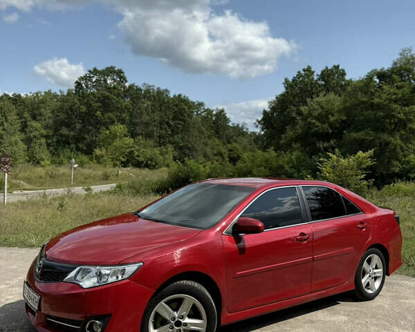 Красный Тойота Камри, объемом двигателя 2.49 л и пробегом 161 тыс. км за 13500 $, фото 3 на Automoto.ua