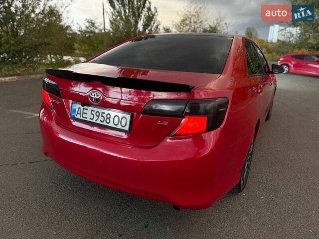 Тойота Камри 2013 в Кривом Роге на Automoto.ua Красный Тойота Камри, объемом двигателя 2.5 л и пробегом 177 тыс. км за 10700 $, фото 21 на Automoto.ua